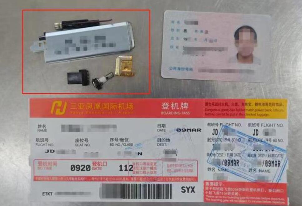 三亞機場安檢門檢測人員發現違禁拆分隱匿打火機[圖].jpg